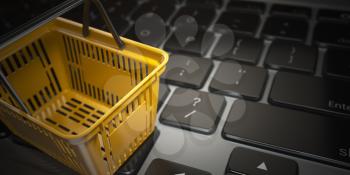 E-commerce, online shopping, internet purchases concept.  Yellow shopping basket on computer laptop keyboard, 3d illustration