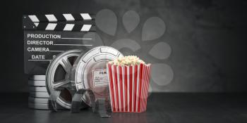 Cinema movie concept  background. Film reel and tape, popcorn and clapperboard on black grunge background. 3d illustratioon
