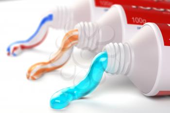Tubes of toothpaste in different colors and different types of toothpaste. 3d illustration