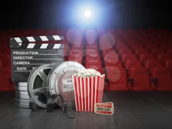 Cinema, movie or home video concept background. Film reels, clapper board  and pop corn in the theater movie cinema screen with empty seats. 3d illustration