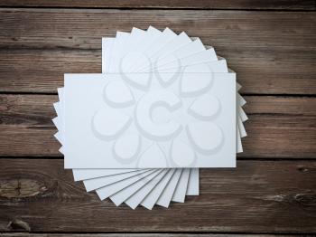 White blank business cards mockup template on the wooden table. 3d illustration