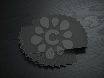 Black blank business cards mockup template on the black wooden table. 3d illustration