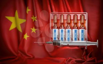 Vaccination in China concept. Syrringe and vials with vaccine on chinese flag. 3d illustration