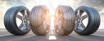 Four car wheel oln the highway with sky background.  Change a tires. 3d illustration