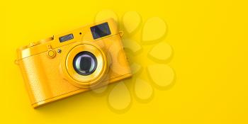 Yellow vintage photo camera on yellow background. 3d illustration