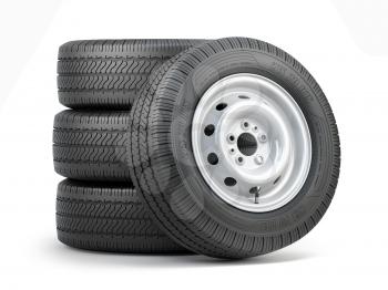 Set of car wheels with tyres for vans and trucks isolated on white background. 3d illustration