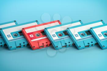 Vintage blue audio cassettes and one unique pink cassete on blue background. Creative retro concept of individuality. 3d illustration