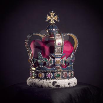 Royal golden crown with jewels on pillow on black background. Symbols of UK United Kingdom monarchy. 3d illustration