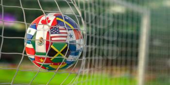 Soccer Football ball with flags of North America countries in net on football stadium. North America concacaf championship 2021. 3d illustration