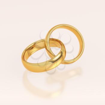 Two golden wedding rings on pink background. Love and marriage concept.