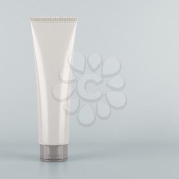 White tube. Product mock up on grey background. Blank packaging for cosmetic products like cream or lotion, as well as tooth paste, hair gel, acrylic paint, sauce and more.