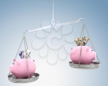 Piggy bank on scales. Dollar versus Euro