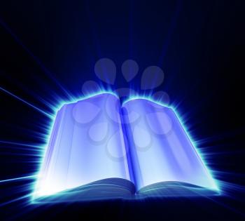 Opened book on black background and with blue glow
