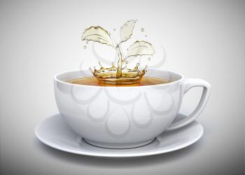 Splash of the tea in form of a plant in white cup