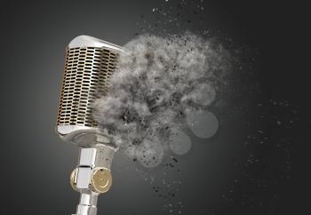 Retro style microphone shattered into dust