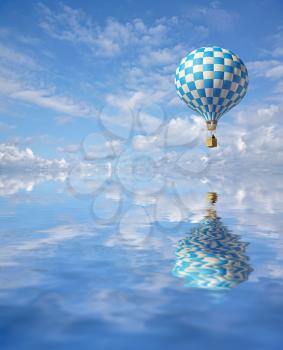 3d balloon in the blue sky and reflection in water