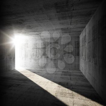 Abstract empty dark concrete interior with sunlight beam