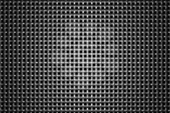 Braided wire steel grid with reflection on black background under the round central light, abstract textured background
