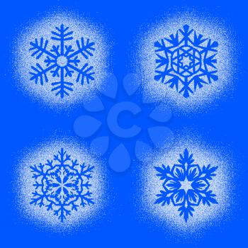 Set of snow marks of snowflakes isolated on blue background