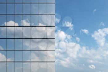 Wall of modern business skyscraper with blue windows in day sunlight under blue sky with clouds raising to the sky closeup front view, business offices corporate building, 3D illustration