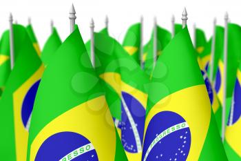 Many small flags of Federative Republic of Brazil isolated on white background, 3d illustration, selective focus, shallow depth of field