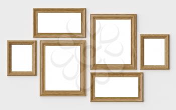 Wooden blank picture or photo frames on white wall with shadows with copy-space, decorative wooden picture frames template set, art frame mock-up 3D illustration