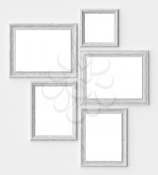 White wood blank picture or photo frames on white wall with shadows with copy-space, decorative wooden picture frames template set, art frame mock-up 3D illustration