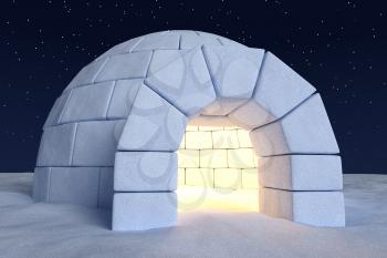 Winter north polar snowy landscape: closeup view of eskimo house igloo icehouse with warm light inside made with snow at night on the surface of snow field under cold night north sky with stars
