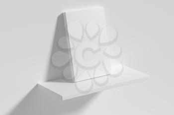 Blank white empty rectangular poster on white shelf leaning at empty white wall, top diagonal view, white bleached colorless poster mock-up, 3D Illustration