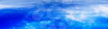 Horizontal wide panorama blue vivid above cloudscape background backdrop