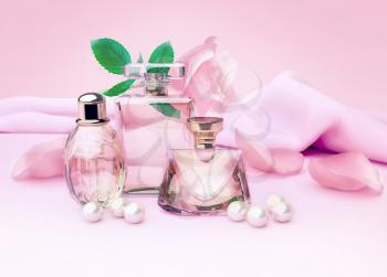 Perfume bottles and flower rose, petals and pearls on pink silk. 3D illustration