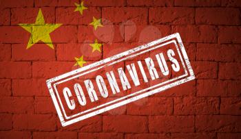 Flag of the China with original proportions. stamped of Coronavirus. brick wall texture. Corona virus concept. On the verge of a COVID-19 or 2019-nCoV Pandemic.