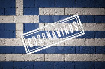 Flag of the Greece with original proportions. stamped of Coronavirus. brick wall texture. Corona virus concept. On the verge of a COVID-19 or 2019-nCoV Pandemic.