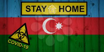 flag of Azerbaijan in original proportions. Quarantine and isolation - Stay at home. flag with biohazard symbol and inscription COVID-19.