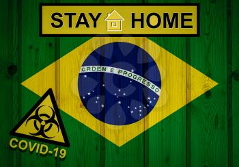 Flag of the Brazil in original proportions. Quarantine and isolation - Stay at home. flag with biohazard symbol and inscription COVID-19.