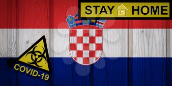 Flag of the Croatia in original proportions. Quarantine and isolation - Stay at home. flag with biohazard symbol and inscription COVID-19.