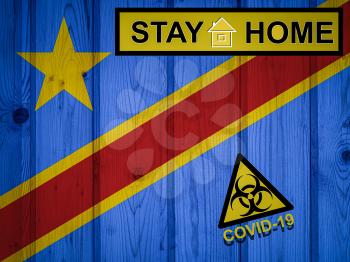 Flag of the Democratic Republic of the Congo in original proportions. Quarantine and isolation - Stay at home. flag with biohazard symbol and inscription COVID-19.