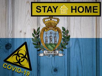 Flag of the San Marino in original proportions. Quarantine and isolation - Stay at home. flag with biohazard symbol and inscription COVID-19.