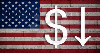 symbolic depreciation of the national currency Dollar against of the country flag of USA or America. Concept of depreciation of currency, economy fall and the breakdown of economic ties