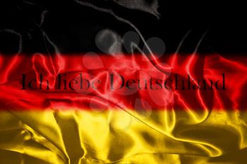 German flag blowing in the wind With Letters That Spell I Love Germany