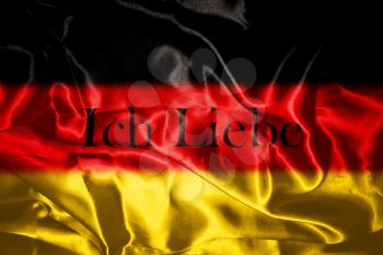 German flag blowing in the wind With Letters That Spell I Love