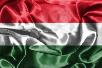 Hungarian National Flag Waving in the Wind Grunge Looking 3D illustration 