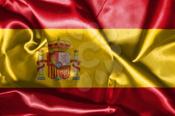 Spanish National Flag With Coat Of Arms Waving In The Wind 3D illustration