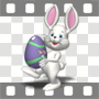 Easter bunny carrying colored egg