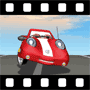 Red sportscar driving along highway