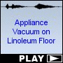 Appliance Vacuum on Linoleum Floor
