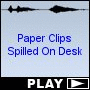 Paper Clips Spilled On Desk