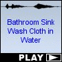 Bathroom Sink Wash Cloth in Water