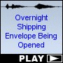 Overnight Shipping Envelope Being Opened