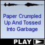 Paper Crumpled Up And Tossed Into Garbage